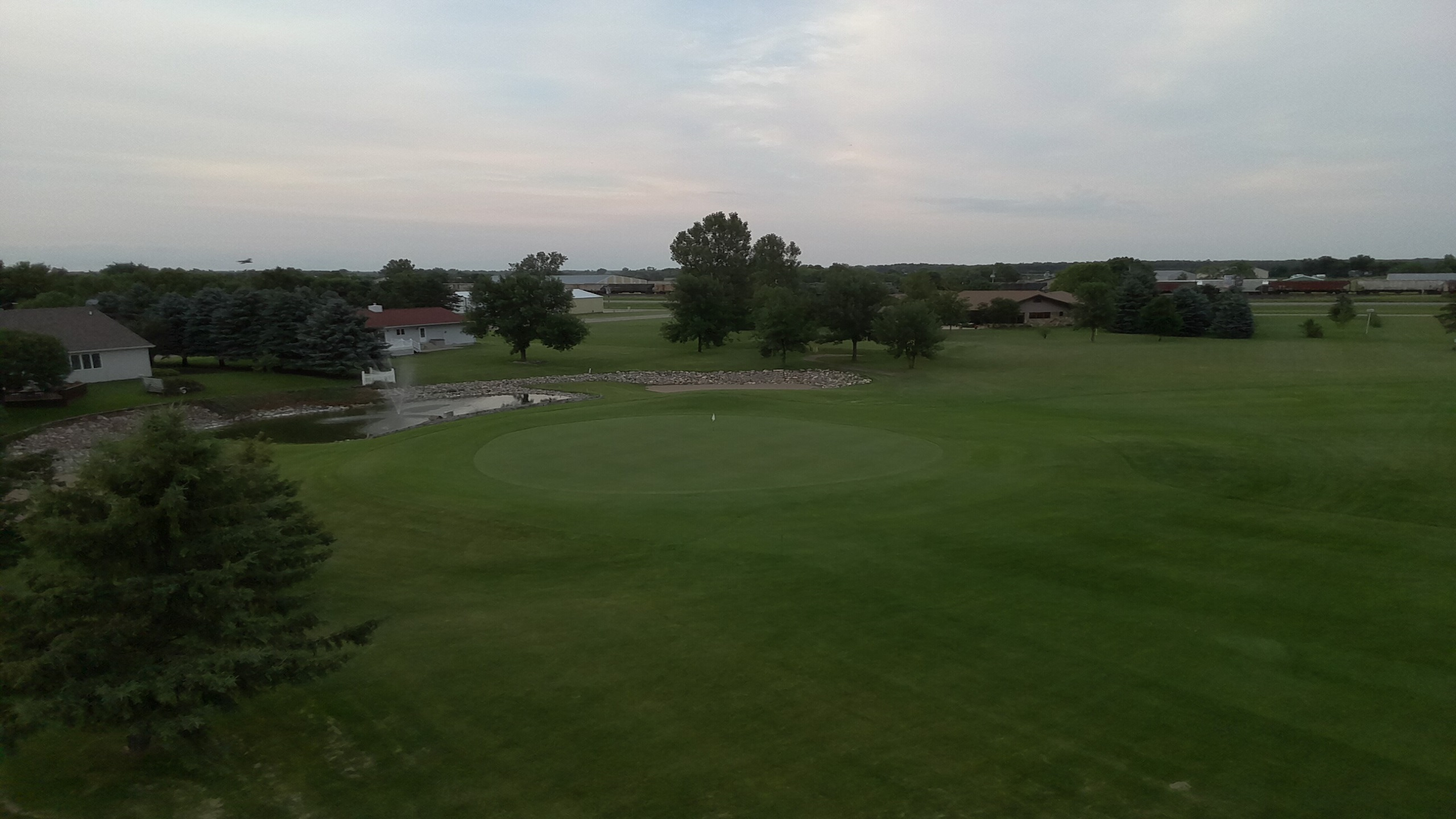 Aerial view of Prairie View Community Golf Course green and pond